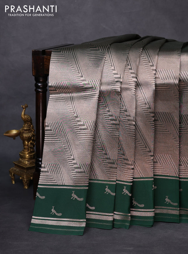 Banarasi katan silk saree green with allover silver zari woven brocade weaves and zari woven butta border