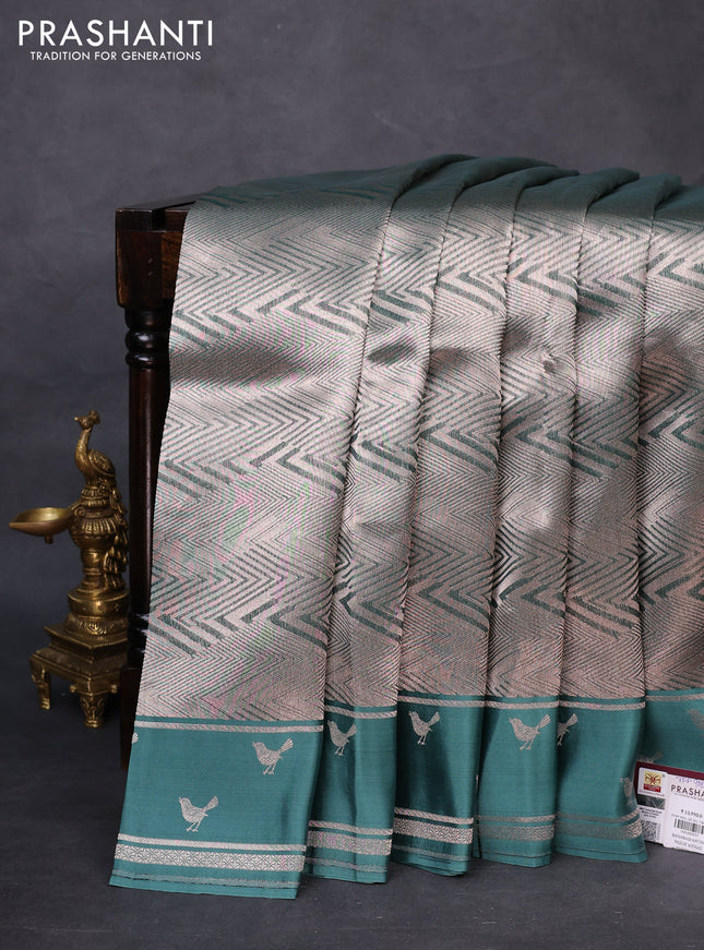 Banarasi katan silk saree pastel green shade with allover zari woven brocade weaves and zari woven butta border
