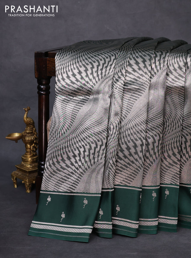 Banarasi katan silk saree bottle green with allover zari woven brocade weaves and zari woven butta border
