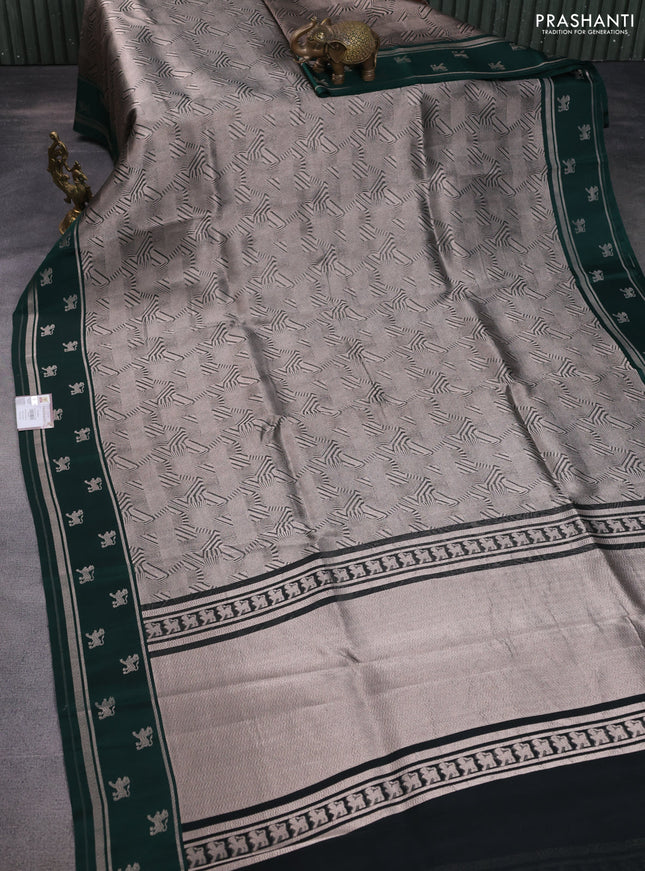 Banarasi katan silk saree bottle green with allover zari woven brocade weaves and zari woven butta border