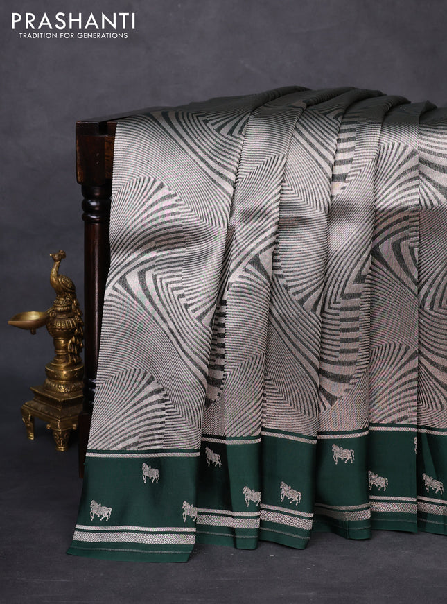 Banarasi katan silk saree bottle green with allover zari woven brocade weaves and zari woven butta border
