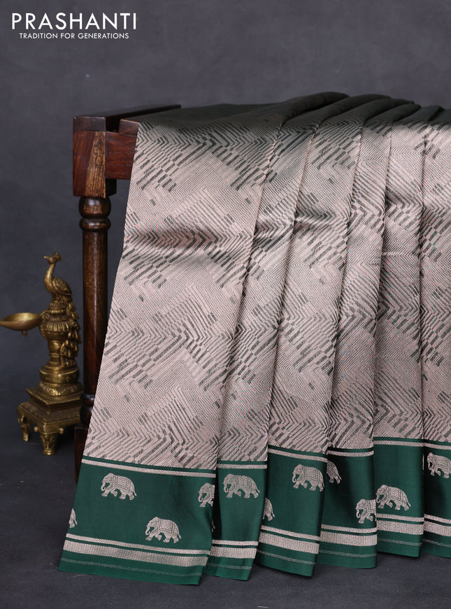 Banarasi katan silk saree green with allover silver zari woven brocade weaves and zari woven butta border