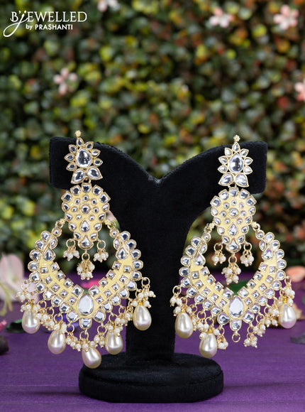 Fashion dangler cream earrings minakari work with kundan stones and beads hangings