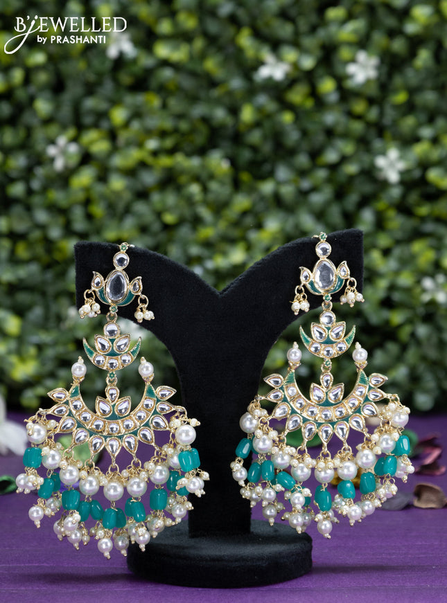 Fashion dangler teal green earrings chandbali design with kundan stones and beads hangings