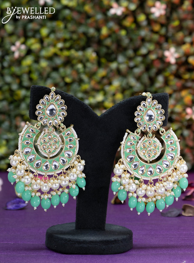 Fashion dangler chanbali teal green minakari earrings with kundan stones and beads hangings