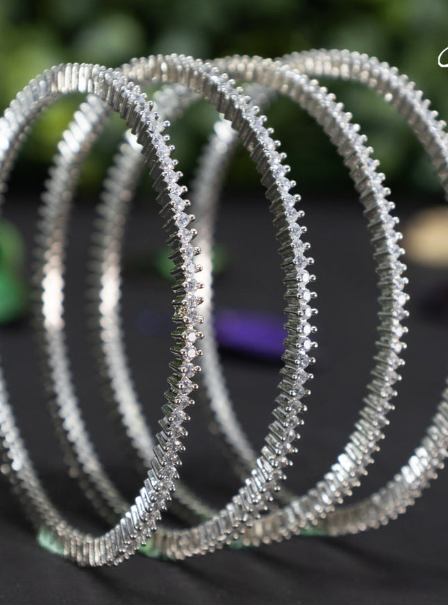 Zircon bangles with cz stones