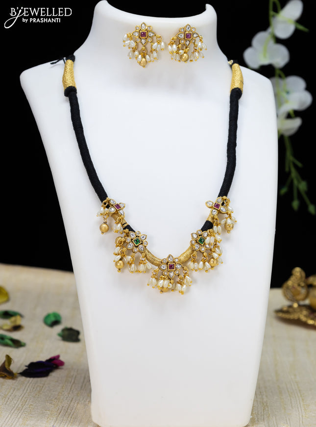 Black thread necklace kemp and cz stone with golden beads hanging