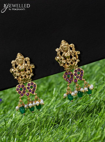 Black thread necklace with kemp stone lakshmi pendant and green beads hangings