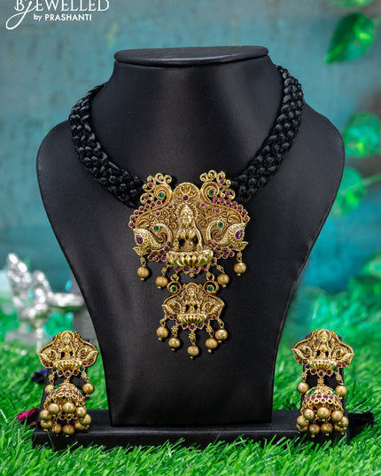 Black thread necklace with lakshmi pendant & kemp stone and golden beads hanging