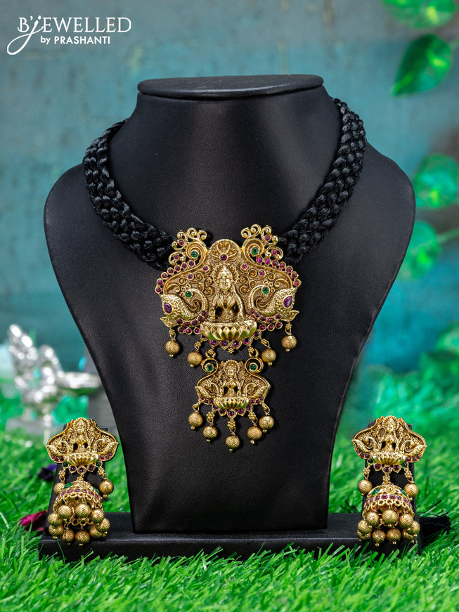 Black thread necklace with lakshmi pendant & kemp stone and golden beads hanging