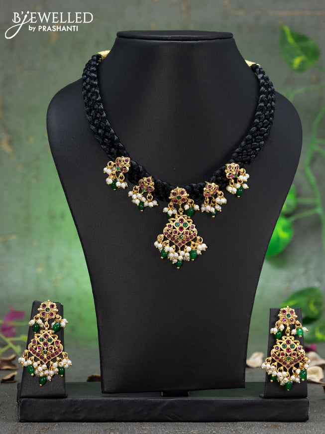 Black thread necklace with kemp stones and pearl & green beads hangings