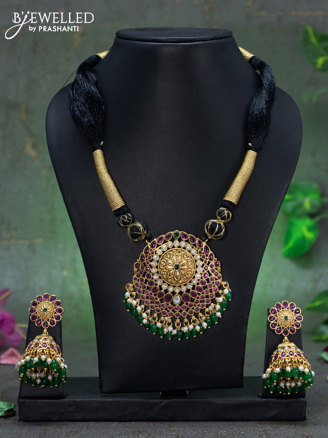 Black thread necklace floral design with kemp & cz stones and green beads hangings