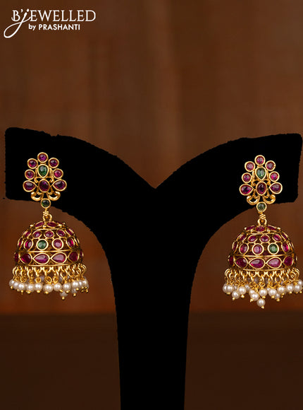 Antique screw type Jhumka with kemp stones and pearl hangings