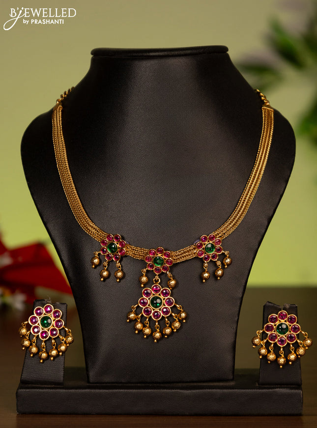 Antique attigai necklace with kemp stones and golden beads hanging