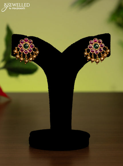 Antique attigai necklace with kemp stones and golden beads hanging