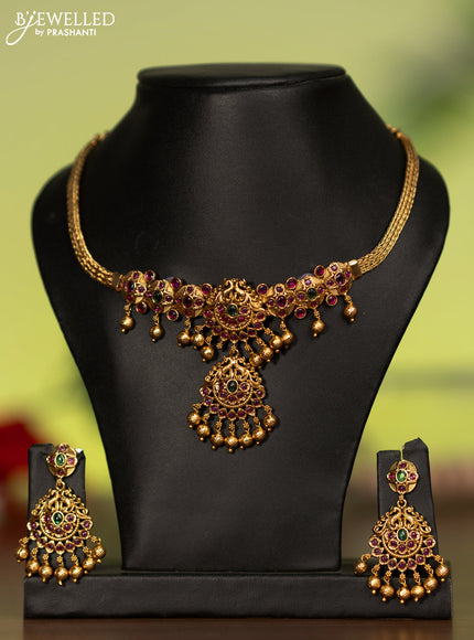 Antique attigai necklace with kemp stones and golden beads hanging