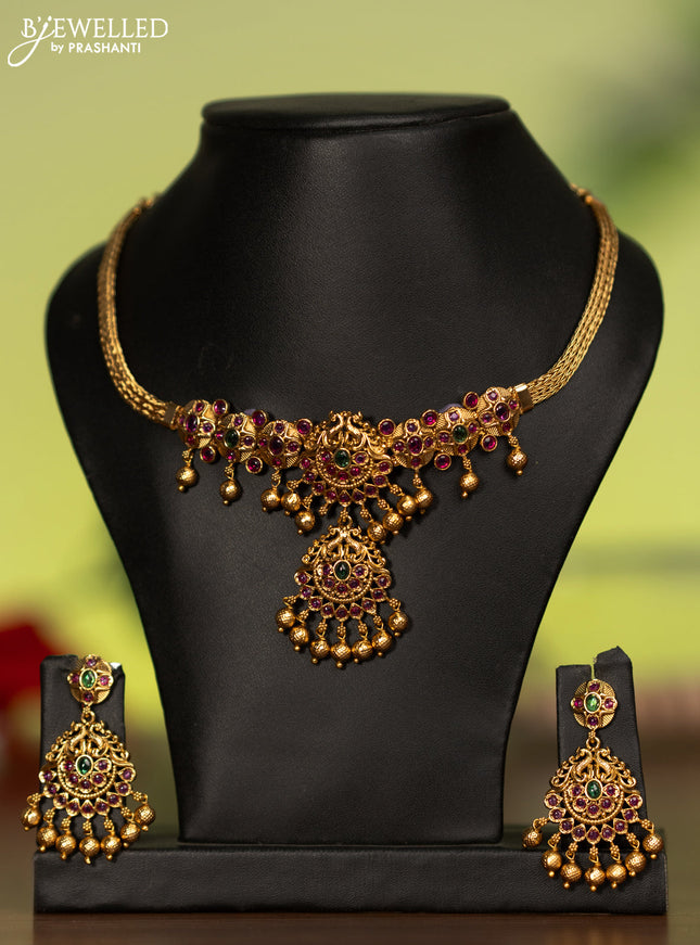 Antique attigai necklace with kemp stones and golden beads hanging