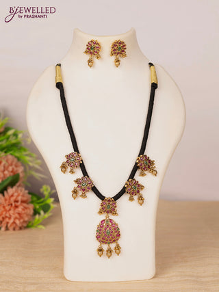 Black thread necklace with kemp stones and golden beads hangings