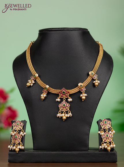 Antique attigai necklace in floral design with kemp stones and pearl hanging