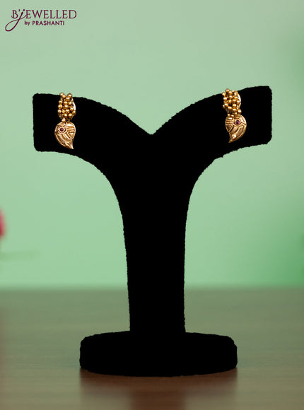 Antique attigai necklace in maanga design with kemp and green stones