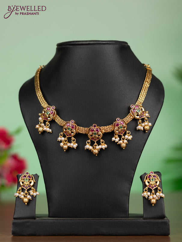 Antique attigai necklace in double peacock design with kemp stones and pearl hanging