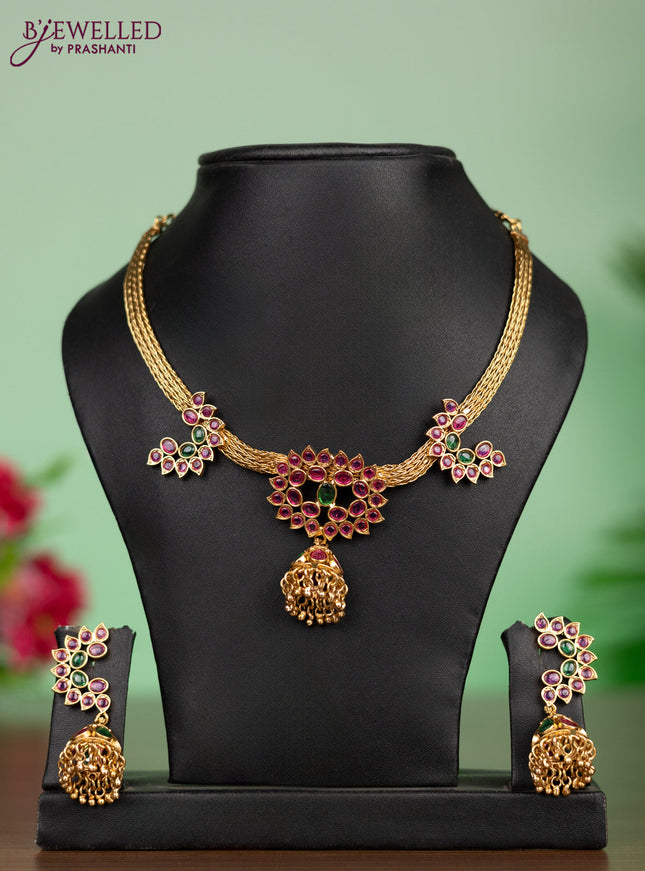 Antique attigai necklace in jhumka design with kemp and green stones