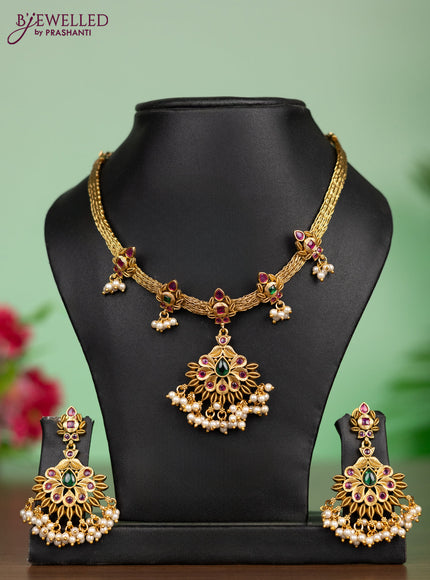 Antique attigai necklace in floral design with kemp stones and pearl hanging