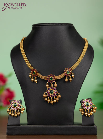 Antique attigai necklace in floral design with kemp stones and golden ball hanging