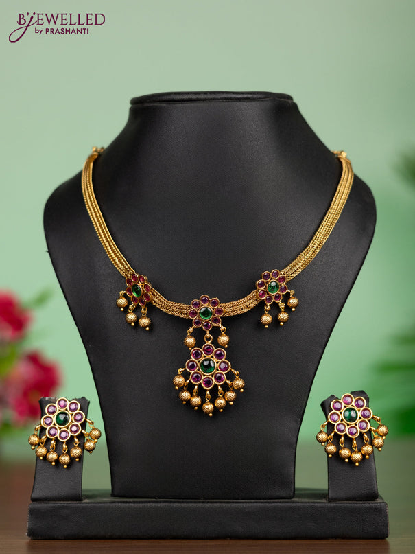 Antique attigai necklace in floral design with kemp stones and golden ball hanging