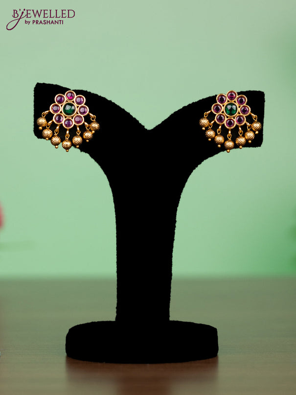 Antique attigai necklace in floral design with kemp stones and golden ball hanging