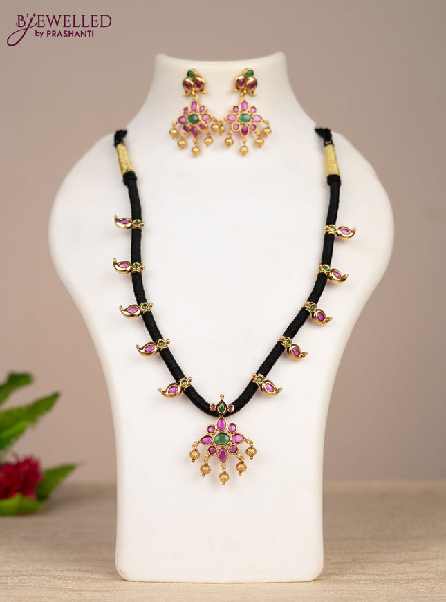 Black thread necklace manga pattern with kemp stones and golden beads hangings