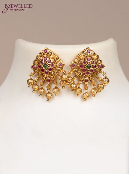 Black thread necklace with kemp stones and golden beads hangings