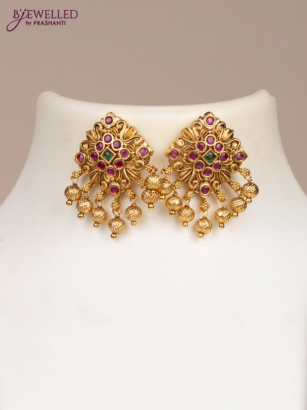 Black thread necklace with kemp stones and golden beads hangings