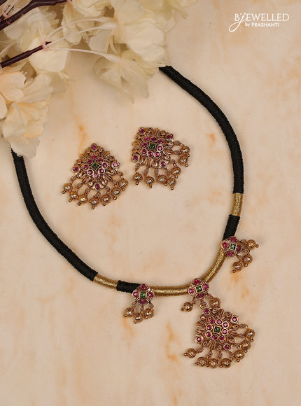 Black thread square design with kemp stones and golden beads hanging