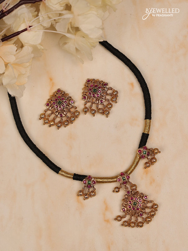 Black thread square design with kemp stones and golden beads hanging