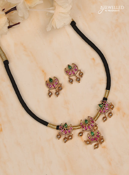 Black thread chandbali design with kemp stones and golden beads hanging
