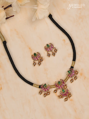 Black thread chandbali design with kemp stones and golden beads hanging