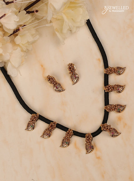Black thread mango design with kemp stones
