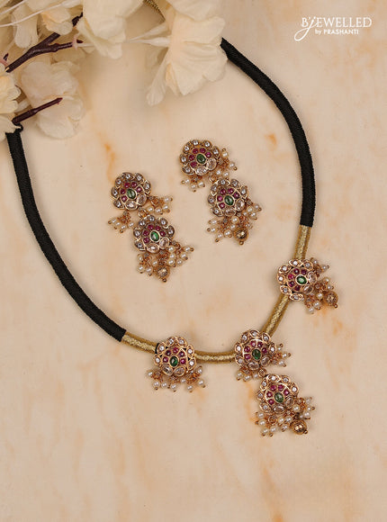 Black thread floral design with kemp stones and golden & pearl beads hanging