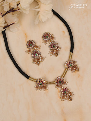 Black thread floral design with kemp stones and golden & pearl beads hanging