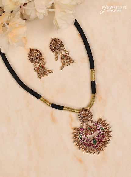 Black thread lakshmi design with kemp stones and golden ball at bottom