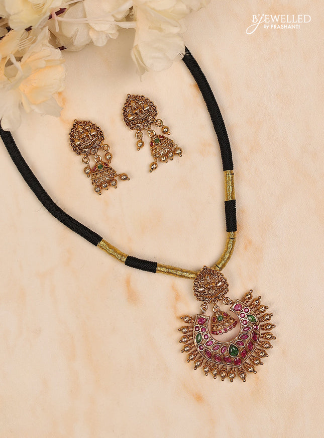 Black thread lakshmi design with kemp stones and golden ball at bottom