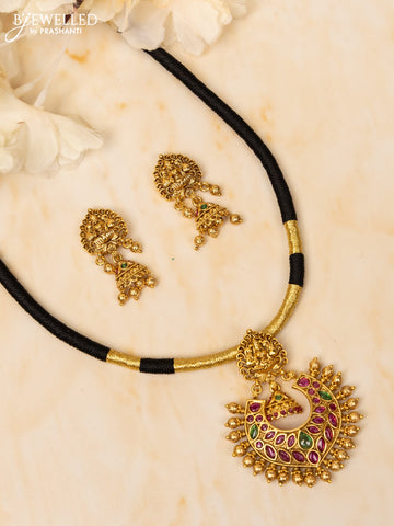 Black thread necklace lakshmi design with kemp stones and golden beads