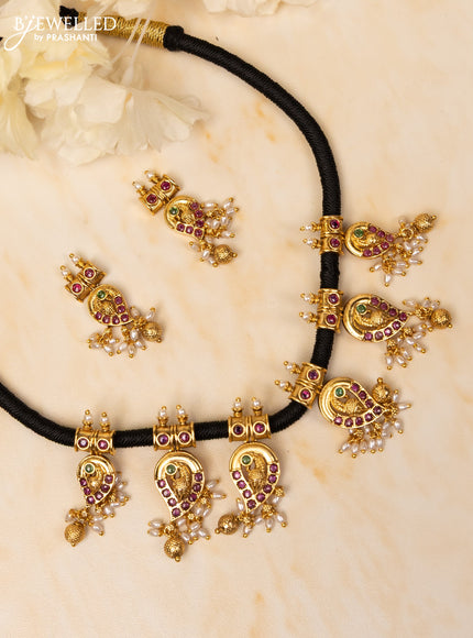 Black thread necklace manga & peacock design with kemp stones in pearl and golden beads hangings
