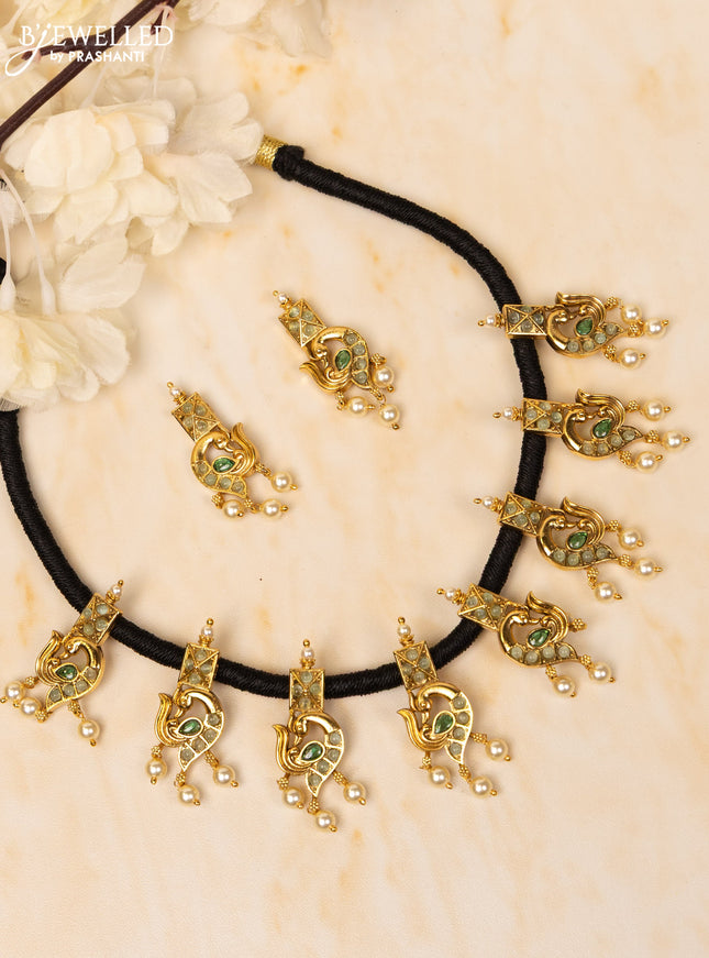 Black thread necklace peacock design with emerald and mint green stones and pearl hangings