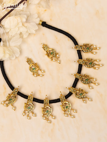 Black thread necklace peacock design with emerald and mint green stones and pearl hangings