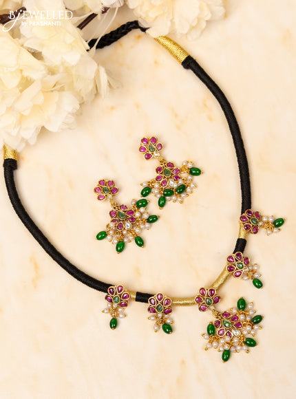 Black thread necklace with kemp and kundan stones in pearl & green beads hangings