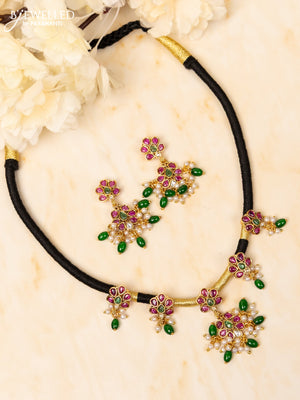 Black thread necklace with kemp and kundan stones in pearl & green beads hangings
