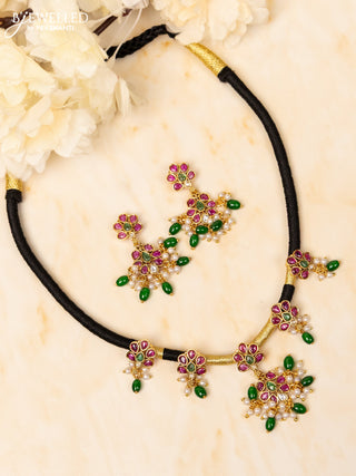 Black thread necklace with kemp and kundan stones in pearl & green beads hangings