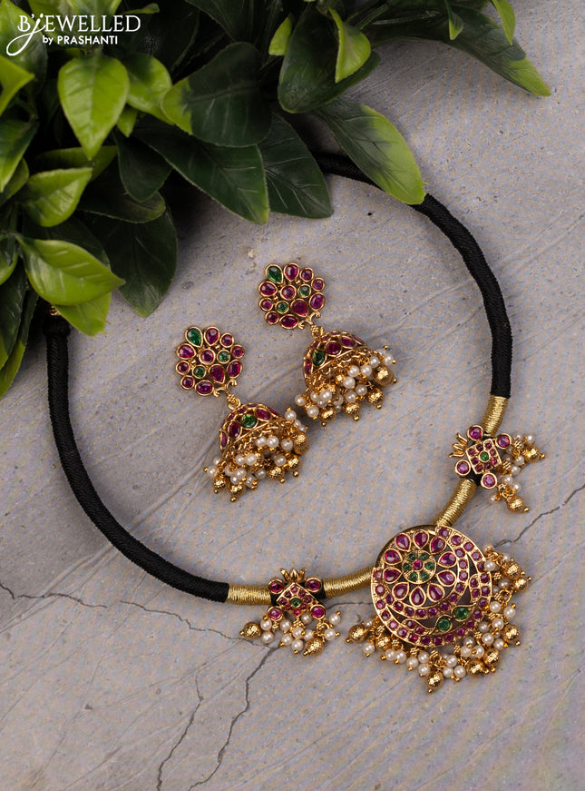 Black thread necklace with kemp stones and pearl & golden beads hanging